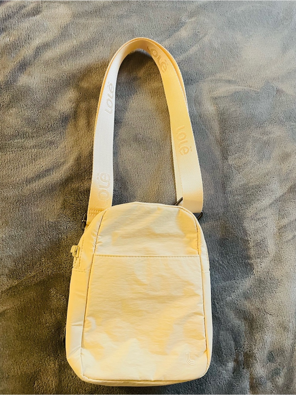 Lole Cream Crossbody Bag with Branded Webbing Strap